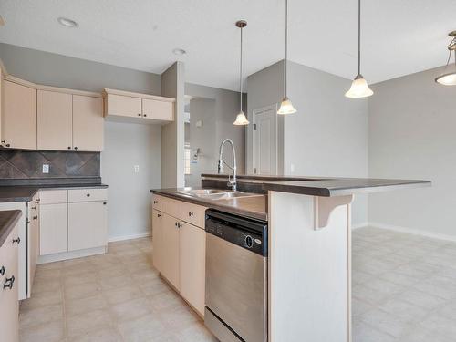 Edmonton, AB - Indoor Photo Showing Kitchen With Double Sink