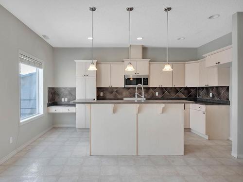 Edmonton, AB - Indoor Photo Showing Kitchen With Double Sink