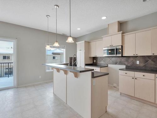 Edmonton, AB - Indoor Photo Showing Kitchen