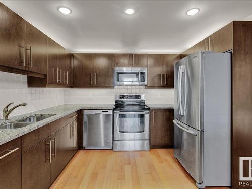 707 6608 28 Avenue, Edmonton, AB - Indoor Photo Showing Kitchen With Stainless Steel Kitchen With Double Sink