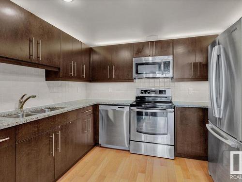 707 6608 28 Avenue, Edmonton, AB - Indoor Photo Showing Kitchen With Stainless Steel Kitchen With Double Sink