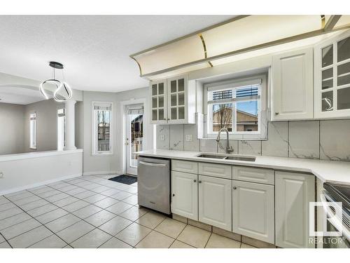 3732 28 Street, Edmonton, AB - Indoor Photo Showing Kitchen With Double Sink