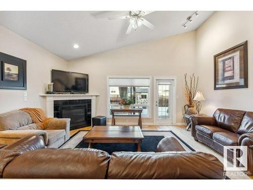 4824 155 Avenue, Edmonton, AB - Indoor Photo Showing Living Room With Fireplace