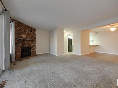 220 10404 24 Avenue, Edmonton, AB - Indoor With Fireplace