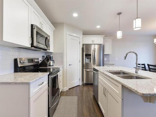 6839 Evans Wynd, Edmonton, AB - Indoor Photo Showing Kitchen With Double Sink With Upgraded Kitchen