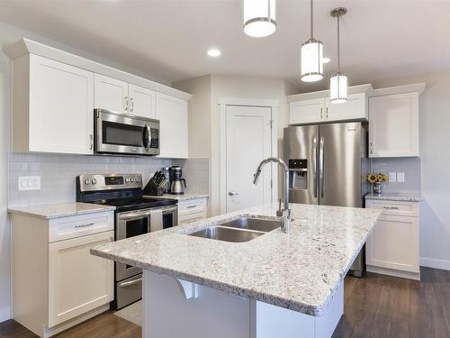 6839 Evans Wynd, Edmonton, AB - Indoor Photo Showing Kitchen With Double Sink With Upgraded Kitchen