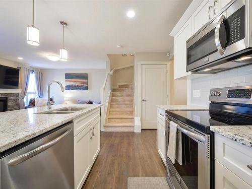 6839 Evans Wynd, Edmonton, AB - Indoor Photo Showing Kitchen With Double Sink With Upgraded Kitchen