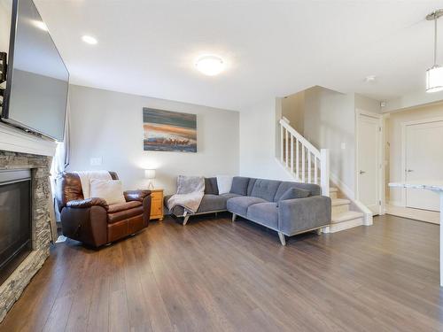 6839 Evans Wynd, Edmonton, AB - Indoor Photo Showing Living Room With Fireplace