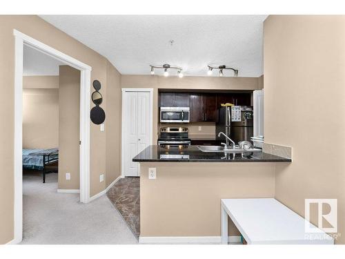 221 111 Watt Common, Edmonton, AB - Indoor Photo Showing Kitchen With Double Sink