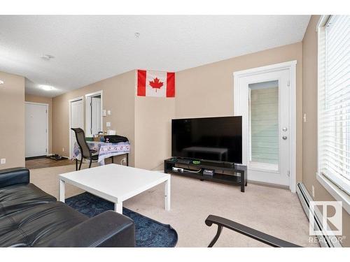 221 111 Watt Common, Edmonton, AB - Indoor Photo Showing Living Room