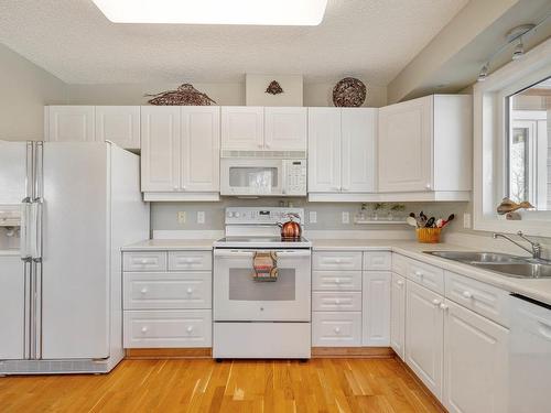 103 7951 96 Street, Edmonton, AB - Indoor Photo Showing Kitchen With Double Sink