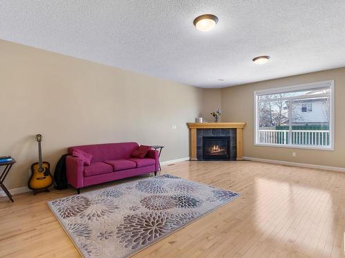 2615 Hanna Crescent, Edmonton, AB - Indoor Photo Showing Living Room With Fireplace