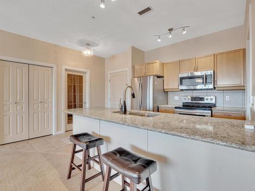 333 160 Magrath Road, Edmonton, AB - Indoor Photo Showing Kitchen With Stainless Steel Kitchen With Double Sink With Upgraded Kitchen