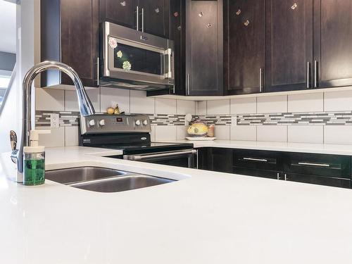 2332 70 Street, Edmonton, AB - Indoor Photo Showing Kitchen With Stainless Steel Kitchen With Double Sink With Upgraded Kitchen