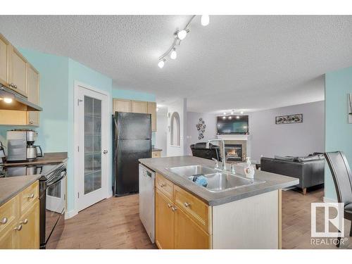 13734 37 Street Nw, Edmonton, AB - Indoor Photo Showing Kitchen With Double Sink