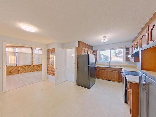 1139 Lakewood Road North, Edmonton, AB - Indoor Photo Showing Kitchen With Double Sink