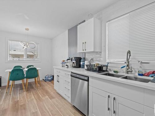 11912 140 Avenue, Edmonton, AB - Indoor Photo Showing Kitchen With Double Sink