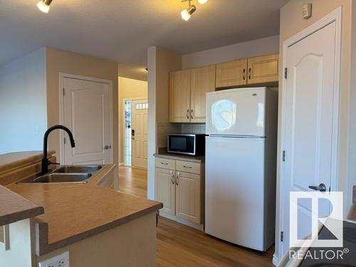 5812 166 Avenue, Edmonton, AB - Indoor Photo Showing Kitchen With Double Sink