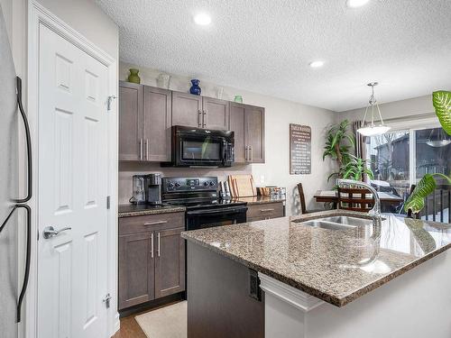 11924 167B Avenue, Edmonton, AB - Indoor Photo Showing Kitchen With Double Sink