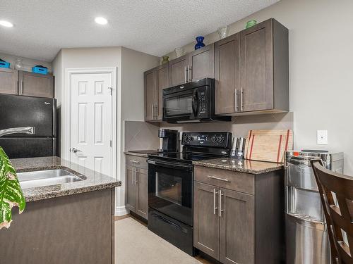 11924 167B Avenue, Edmonton, AB - Indoor Photo Showing Kitchen With Double Sink