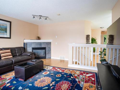 405 85 Street, Edmonton, AB - Indoor Photo Showing Living Room With Fireplace