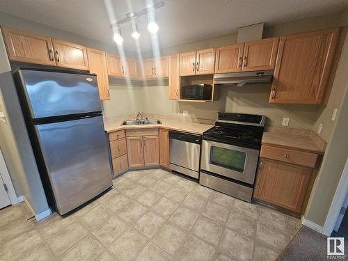 Edmonton, AB - Indoor Photo Showing Kitchen With Double Sink