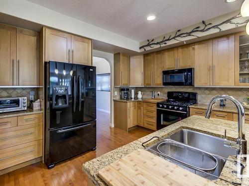 9 1225 Wanyandi Road, Edmonton, AB - Indoor Photo Showing Kitchen With Double Sink