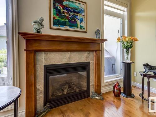 9 1225 Wanyandi Road, Edmonton, AB - Indoor Photo Showing Living Room With Fireplace