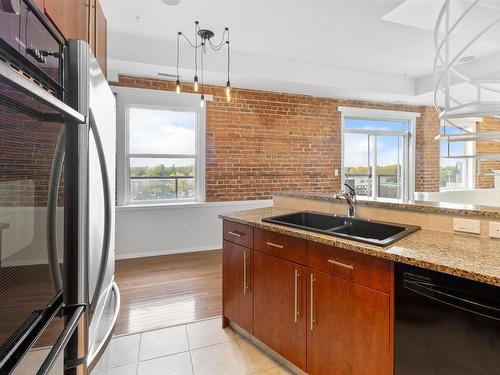 511 10728 82 Avenue, Edmonton, AB - Indoor Photo Showing Kitchen With Double Sink