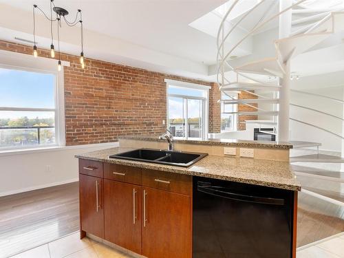 511 10728 82 Avenue, Edmonton, AB - Indoor Photo Showing Kitchen With Double Sink