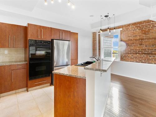 511 10728 82 Avenue, Edmonton, AB - Indoor Photo Showing Kitchen With Double Sink