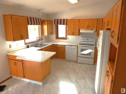 5215 49 Avenue, Onoway, AB - Indoor Photo Showing Kitchen With Double Sink