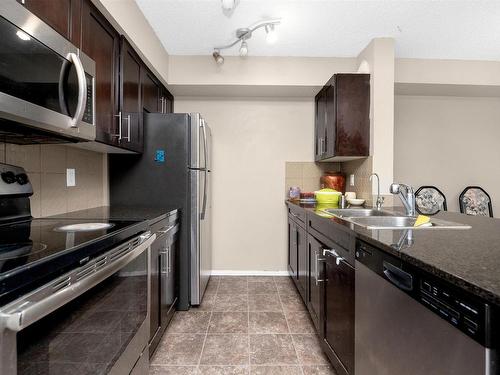 204 3315 James Mowatt Trail, Edmonton, AB - Indoor Photo Showing Kitchen With Stainless Steel Kitchen With Double Sink