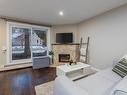 101 8125 110 Street, Edmonton, AB  - Indoor Photo Showing Living Room With Fireplace 