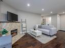 101 8125 110 Street, Edmonton, AB  - Indoor Photo Showing Living Room With Fireplace 