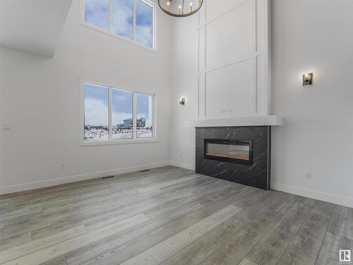 125 Wyatt Ridge, Fort Saskatchewan, AB - Indoor Photo Showing Other Room With Fireplace