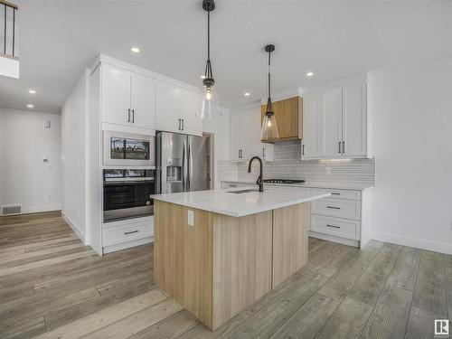 125 Wyatt Ridge, Fort Saskatchewan, AB - Indoor Photo Showing Kitchen With Stainless Steel Kitchen With Upgraded Kitchen