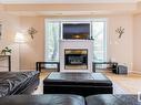 106 10933 82 Avenue, Edmonton, AB  - Indoor Photo Showing Living Room With Fireplace 