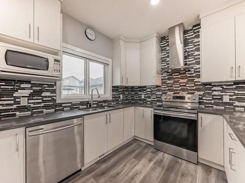 4705 36 Street, Beaumont, AB - Indoor Photo Showing Kitchen With Double Sink With Upgraded Kitchen