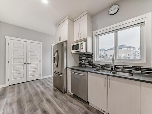 4705 36 Street, Beaumont, AB - Indoor Photo Showing Kitchen With Double Sink