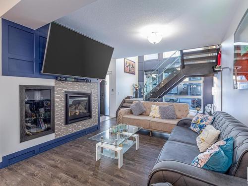 18111 75 Street, Edmonton, AB - Indoor Photo Showing Living Room With Fireplace