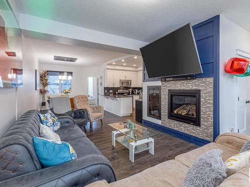 18111 75 Street, Edmonton, AB - Indoor Photo Showing Living Room With Fireplace