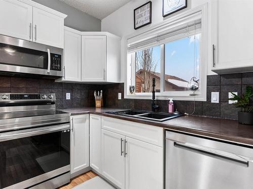 7111 Cardinal Way, Edmonton, AB - Indoor Photo Showing Kitchen With Double Sink