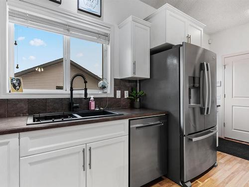 7111 Cardinal Way, Edmonton, AB - Indoor Photo Showing Kitchen With Double Sink