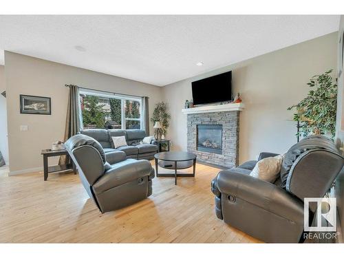 21632 94B Avenue, Edmonton, AB - Indoor Photo Showing Living Room With Fireplace