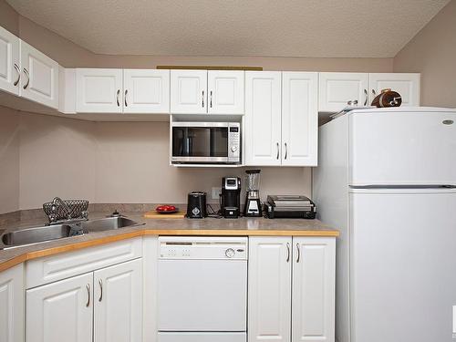 416 5350 199 Street, Edmonton, AB - Indoor Photo Showing Kitchen With Double Sink