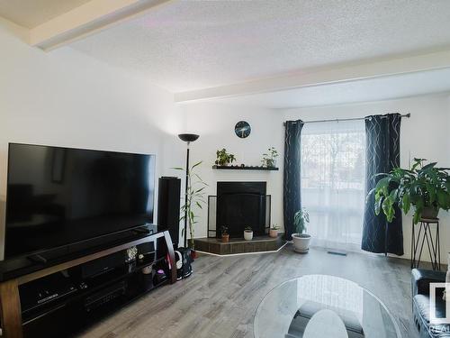 198 Marlborough Place, Edmonton, AB - Indoor Photo Showing Living Room With Fireplace