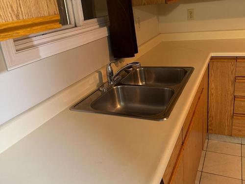 90 7604 29 Avenue, Edmonton, AB - Indoor Photo Showing Kitchen With Double Sink