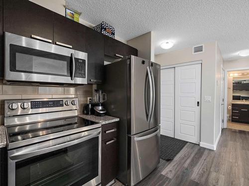 109 14808 125 Street, Edmonton, AB - Indoor Photo Showing Kitchen With Stainless Steel Kitchen