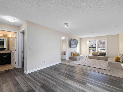 109 14808 125 Street, Edmonton, AB - Indoor Photo Showing Living Room